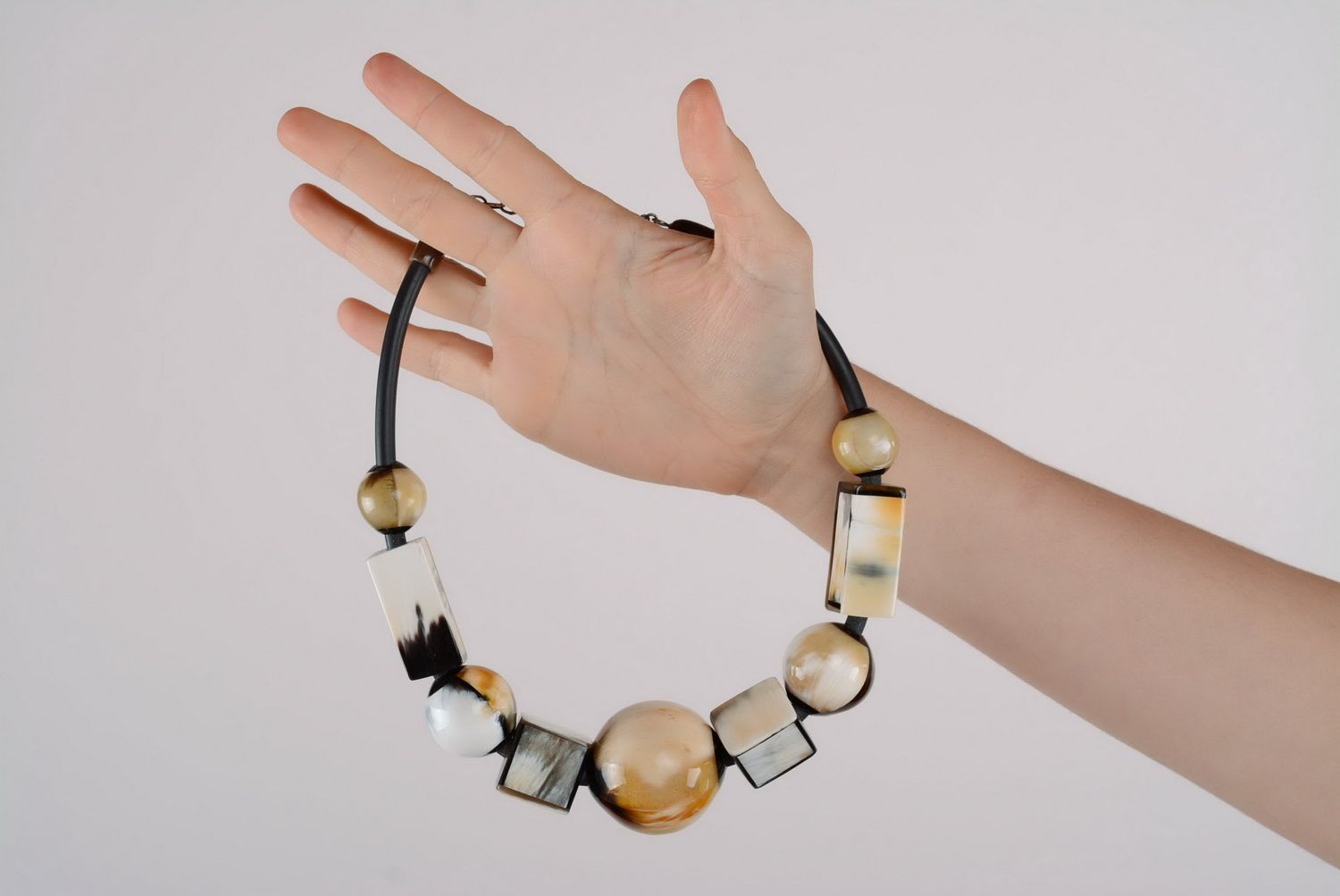 Necklet made of natural cow horn photo 2