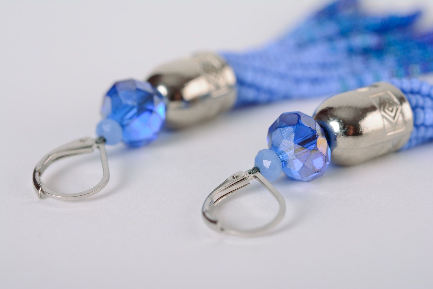 Beautiful women's handmade dangle beaded earrings in blue color palette photo 4