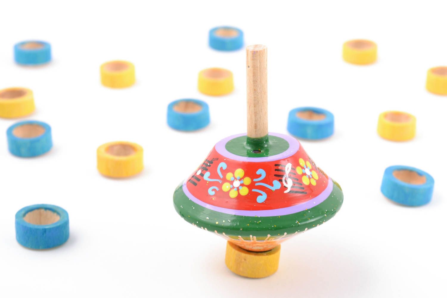 Green and red handmade educational wooden toy spin top with eco painting photo 1