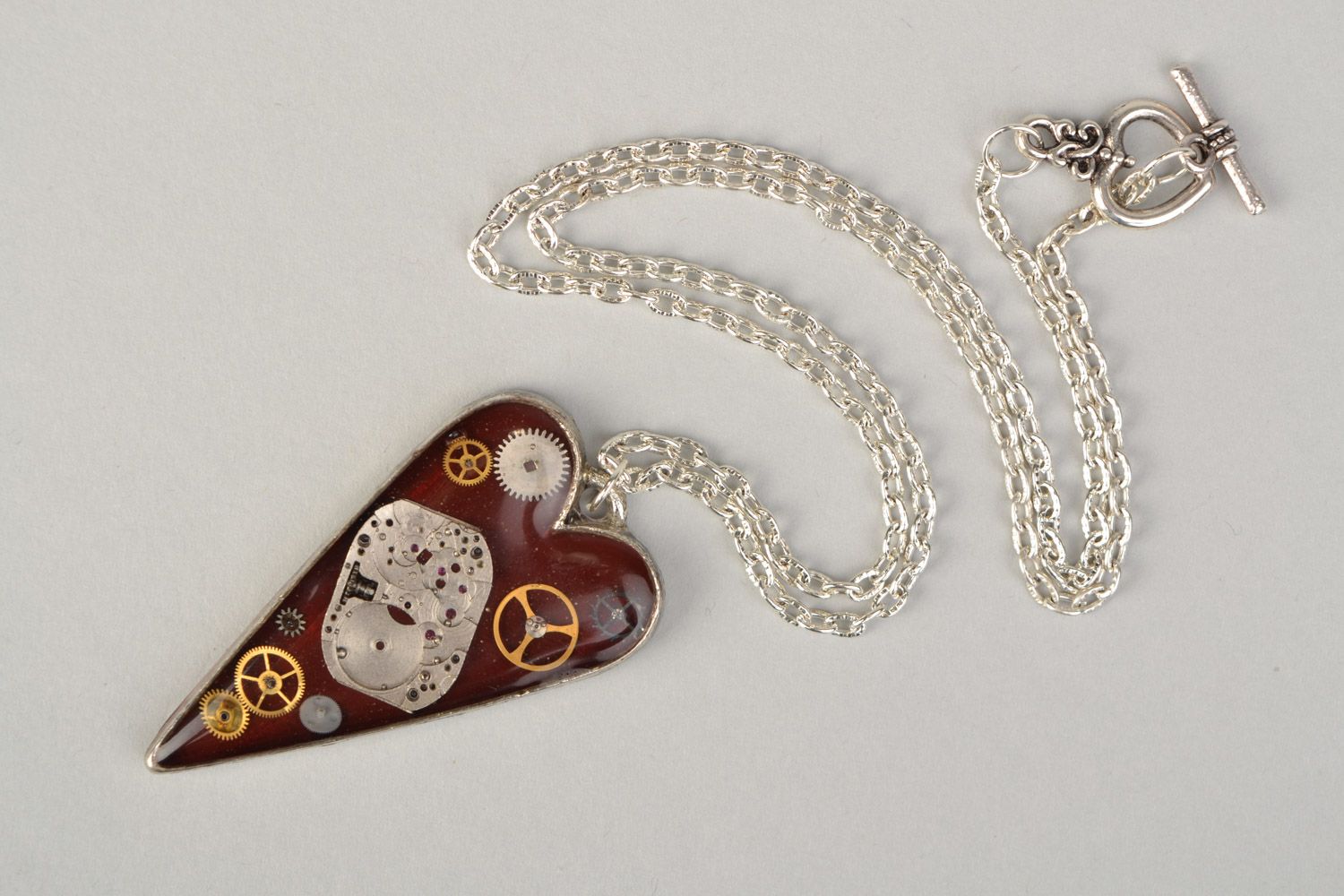Handmade heart-shaped neck pendant in steampunk style with epoxy resin on chain photo 3
