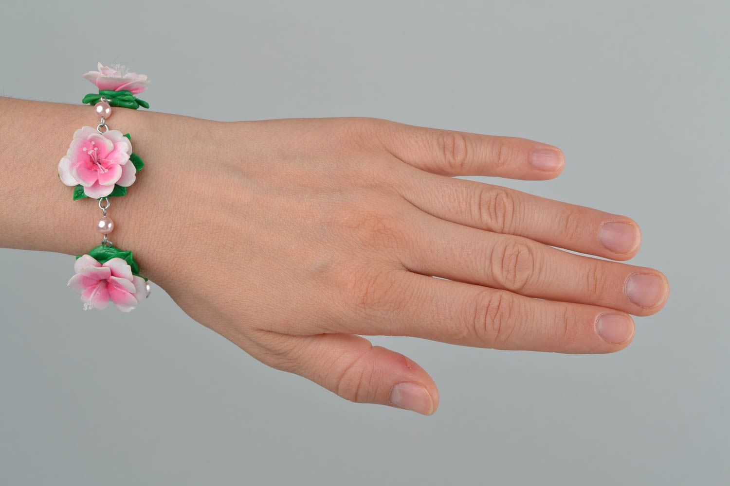 Bright handmade designer wrist bracelet with molded plastic flowers Tea Rose photo 1