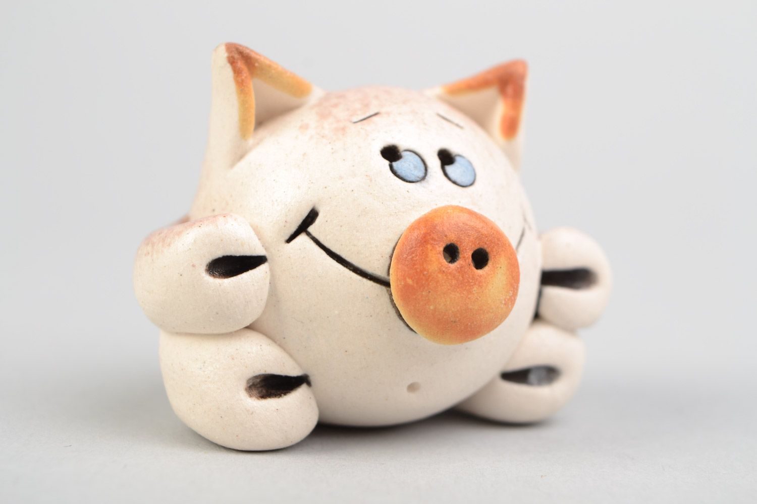 Handmade designer clay figurine painted with glaze Smiling Pig photo 1