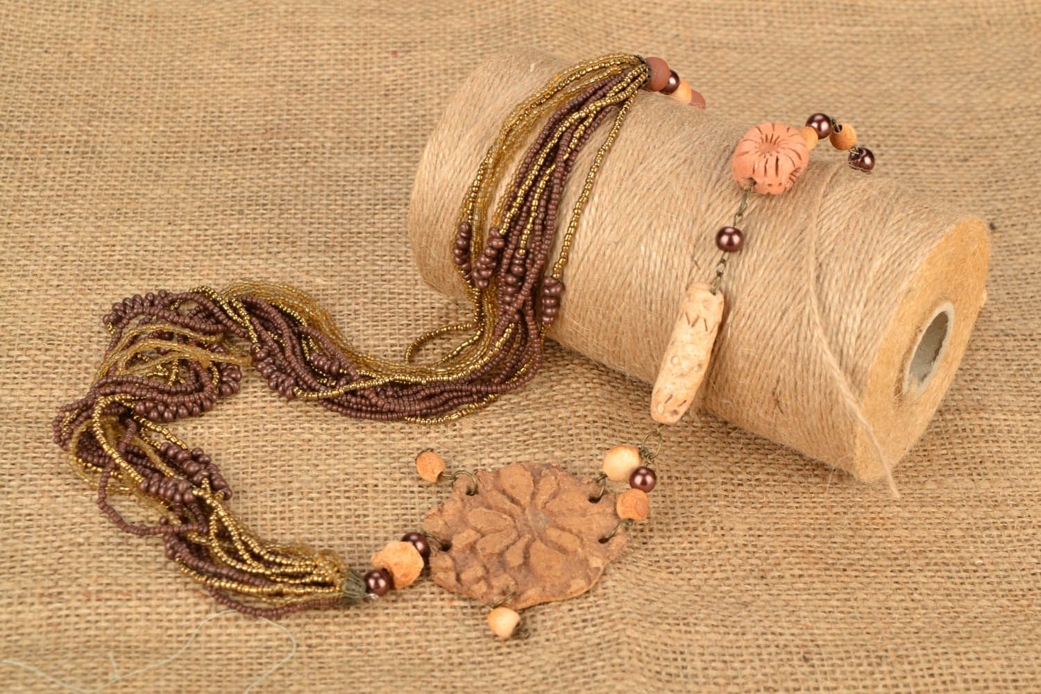 Necklace made of natural clay and beads photo 1