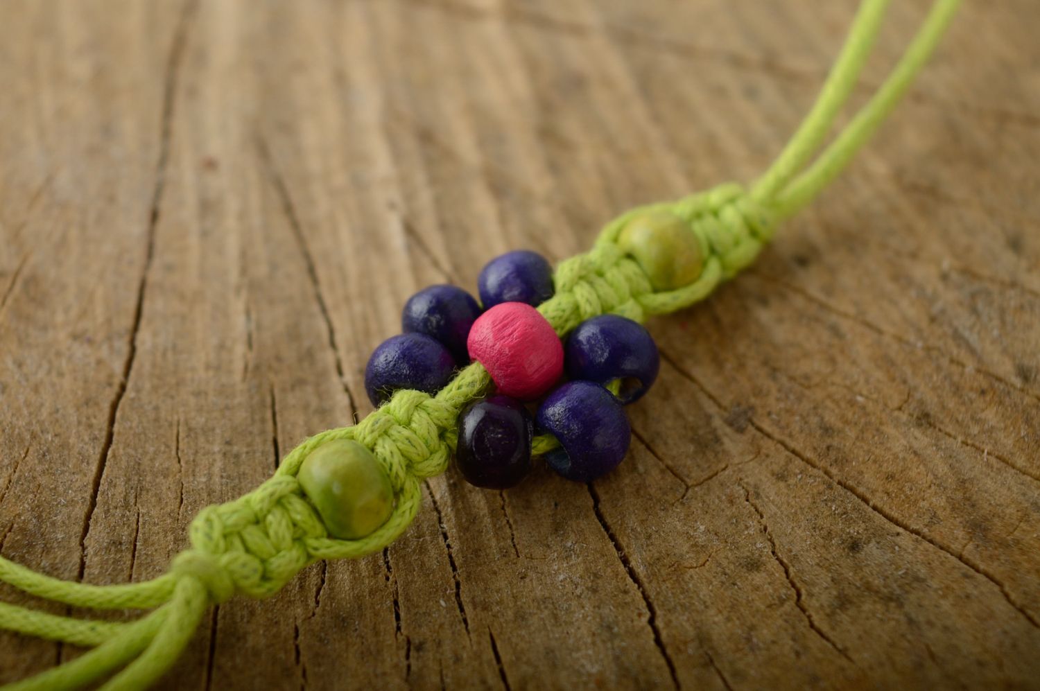 Macrame woven cord bracelet with wooden beads photo 2