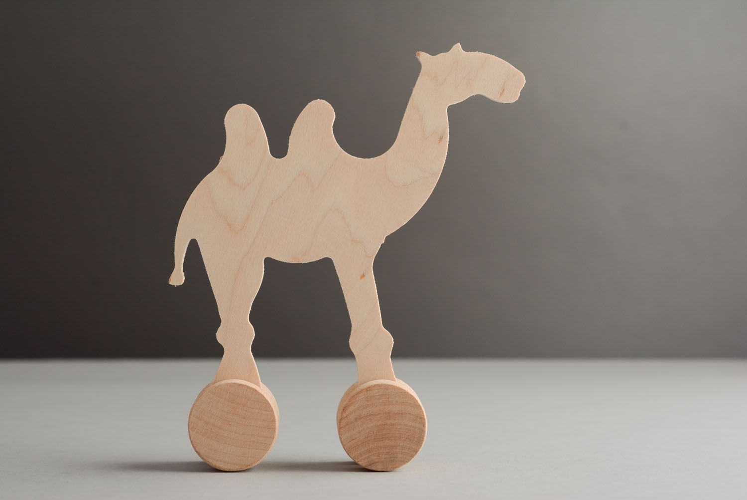 Kamel Spielzeug zum Nachziehen foto 1