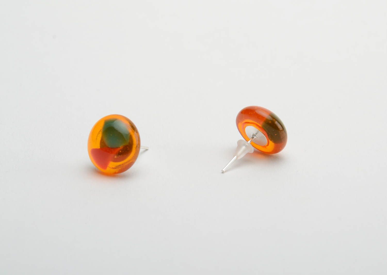 Handmade transparent orange stud earrings made using glass fusing technique photo 3