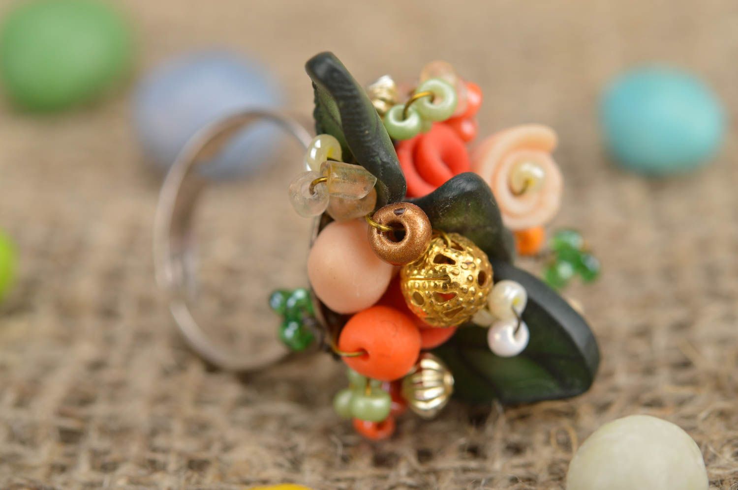 Handmade ring made of polymer clay with beads on adjustable foundation photo 1