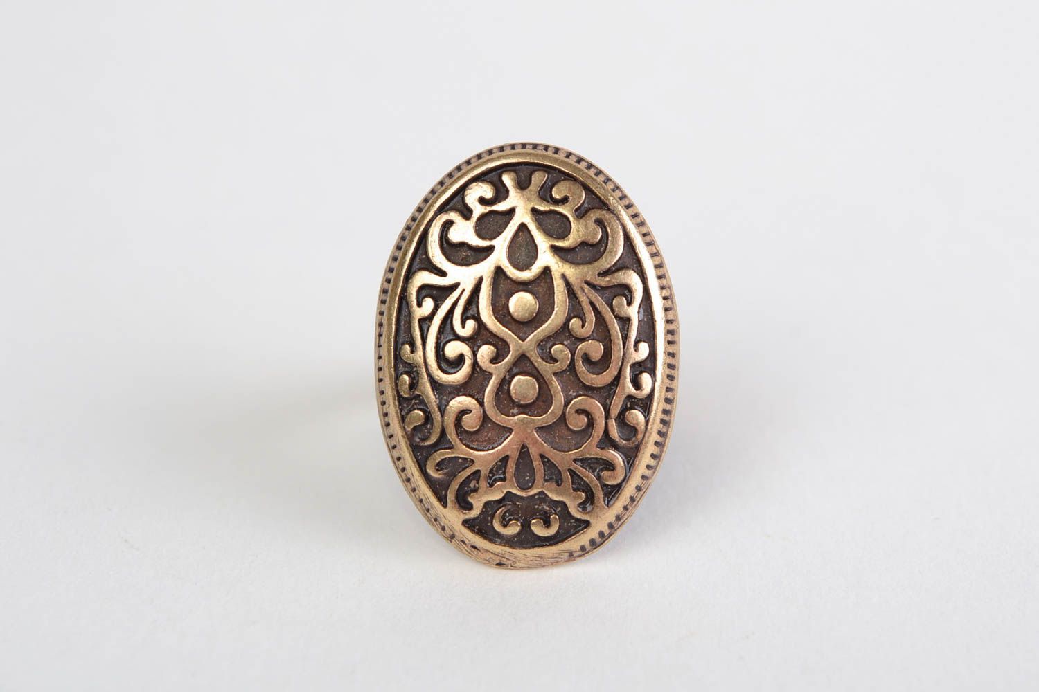 Handmade oval jewelry ring cast of metal alloy with ornament in ethnic style photo 2