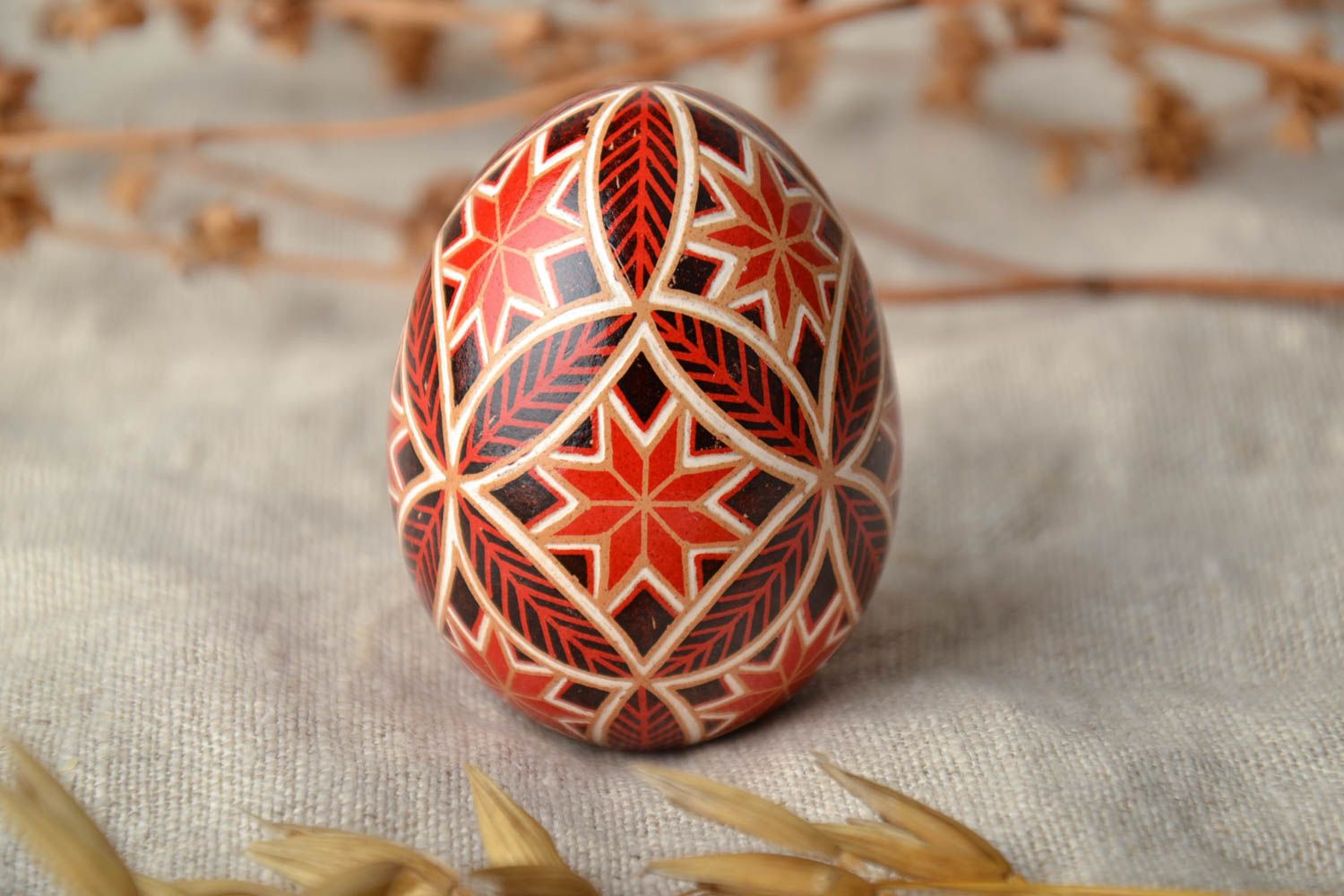 Handmade pysanka with traditional symbolics photo 1