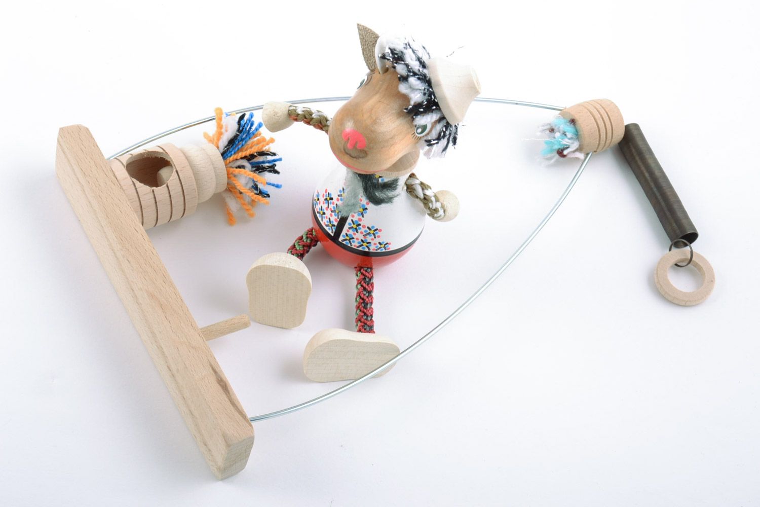 Деревянная игрушка козлик на качелях ручной работы с росписью на пружине детская фото 5