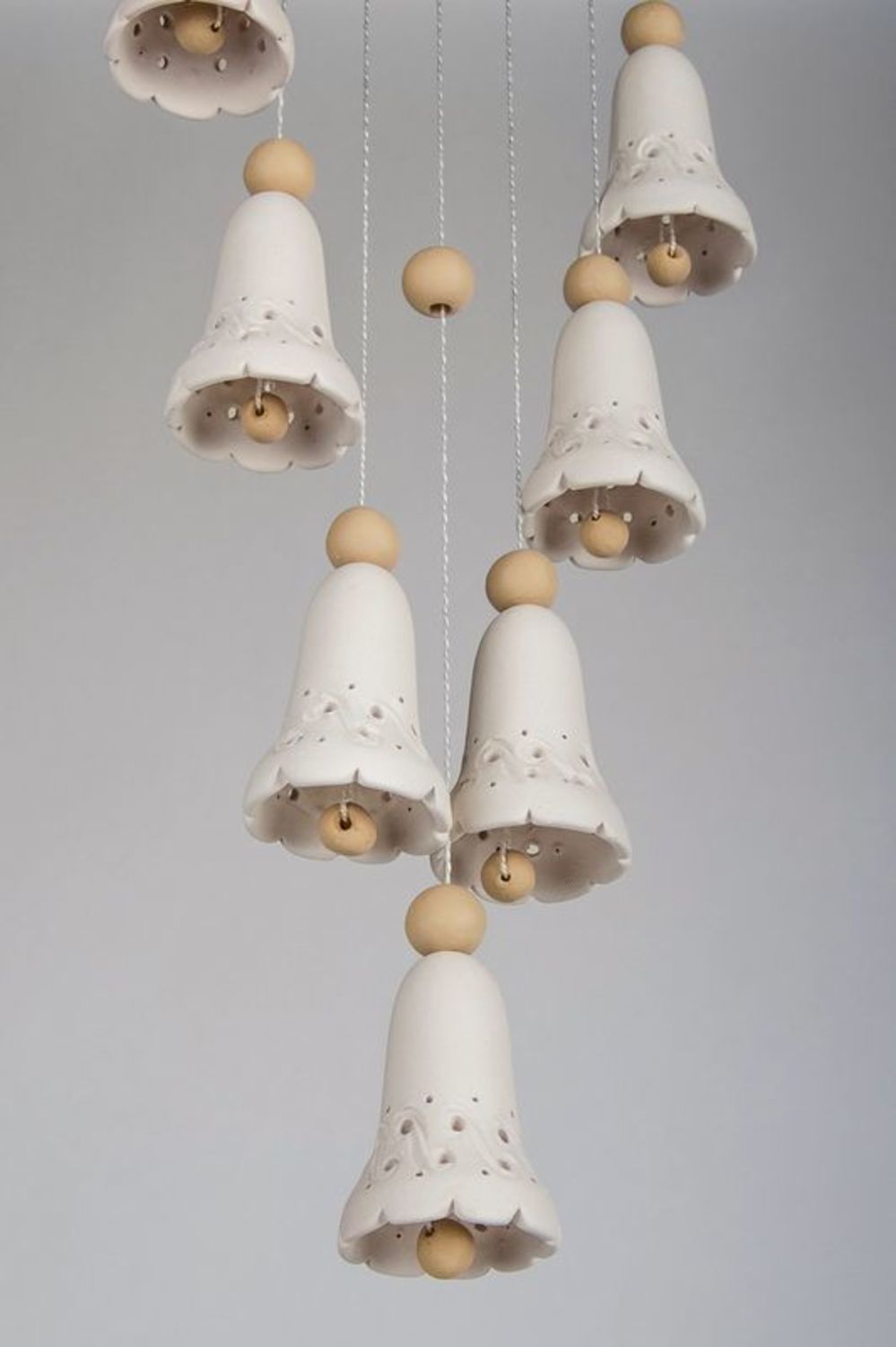 White and brown ceramic bells  photo 4