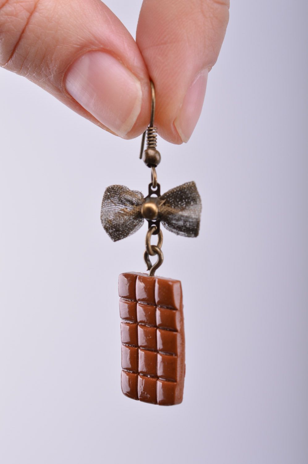 Homemade plastic earrings with charms in the shape of chocolate bars photo 2