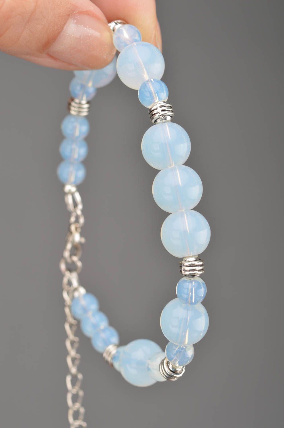 Beautiful women's handmade designer glass bead bracelet of gentle blue color photo 2