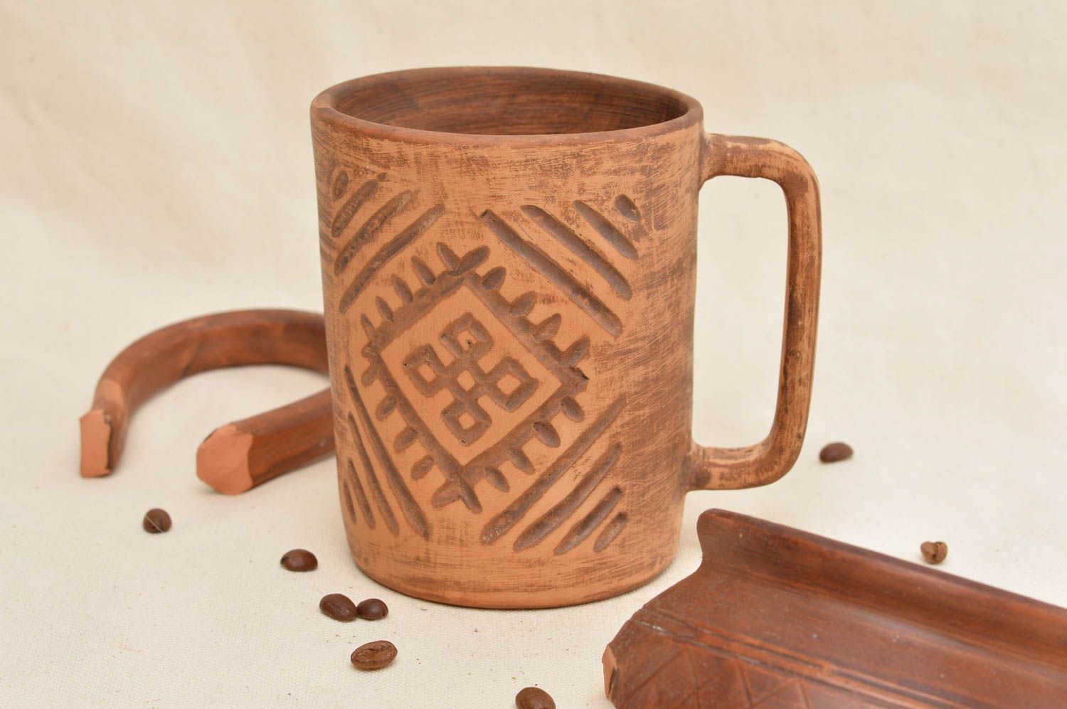 Clay handmade coffee mug with square handle and geometric pattern photo 1