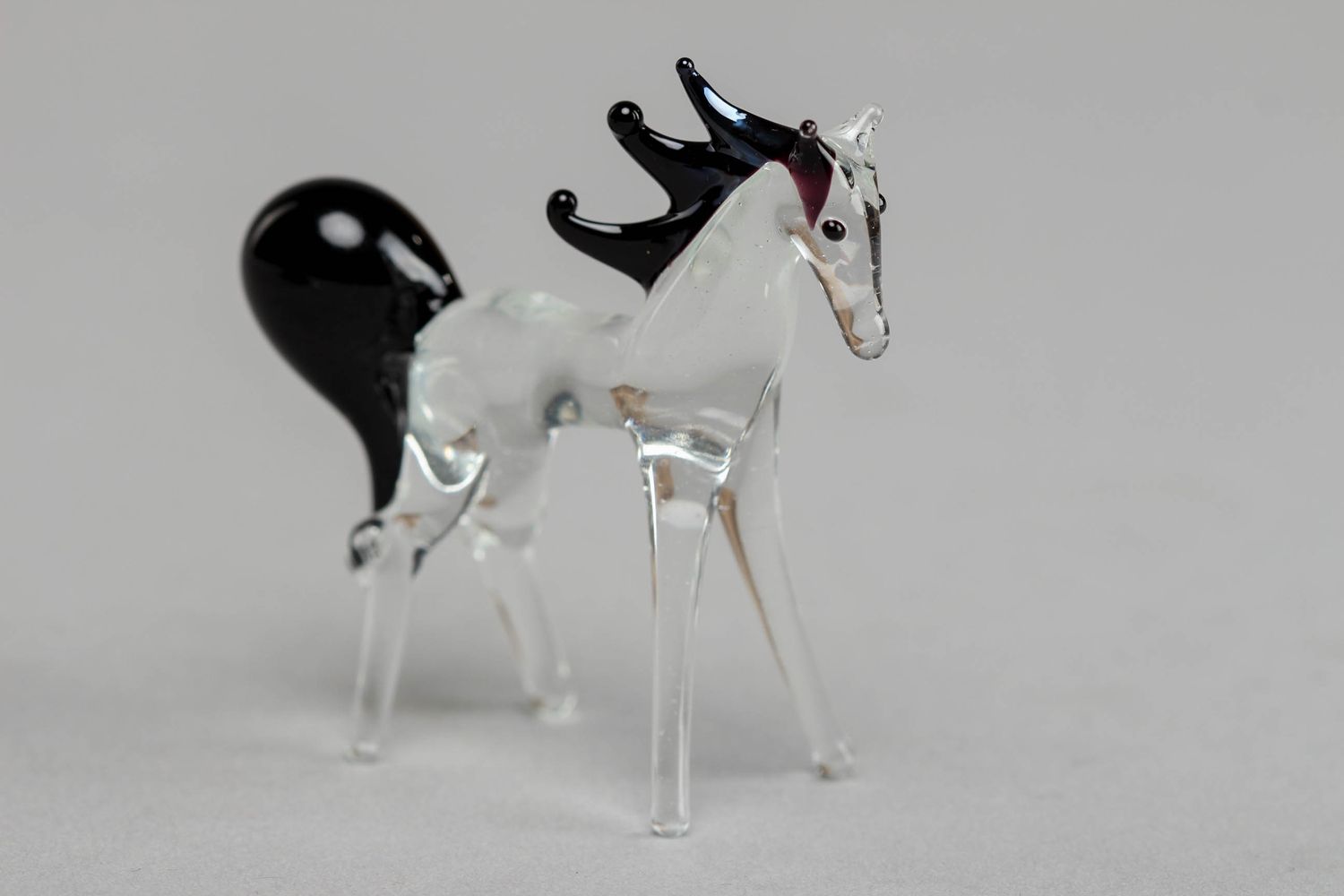 Unusual miniature glass figurine of horse photo 1