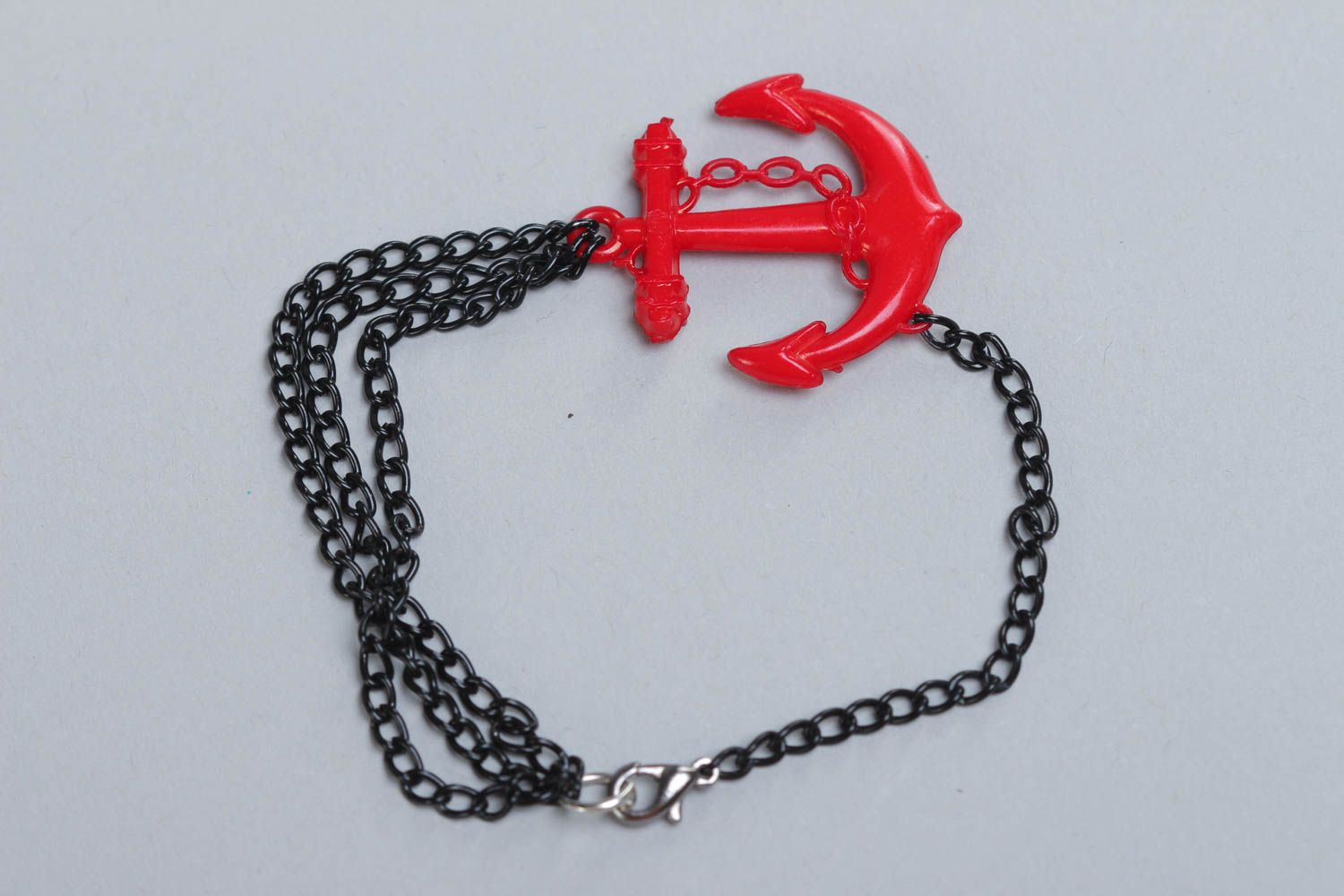 Handmade festive red and black metal and plastic wrist bracelet photo 2