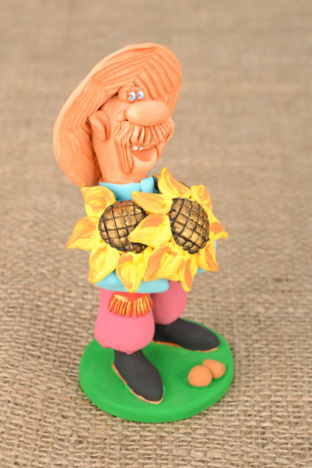 Ceramic figurine Cossack with Sunflower photo 1