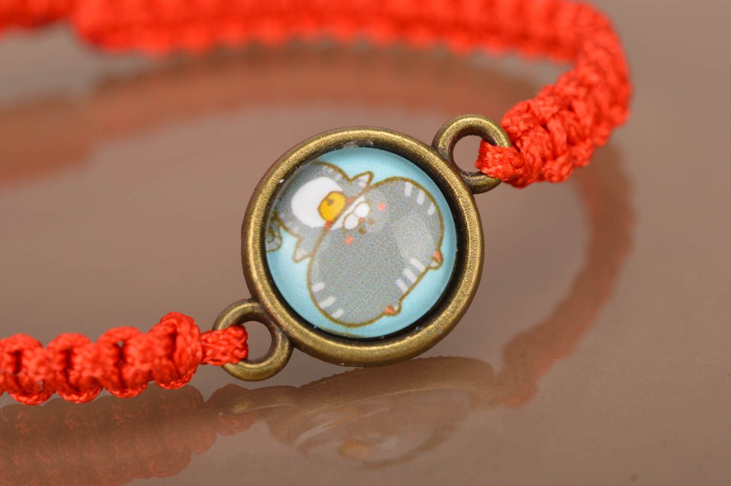 Bracelet tressé en cordon ciré fait main original avec une perle pour femme photo 3