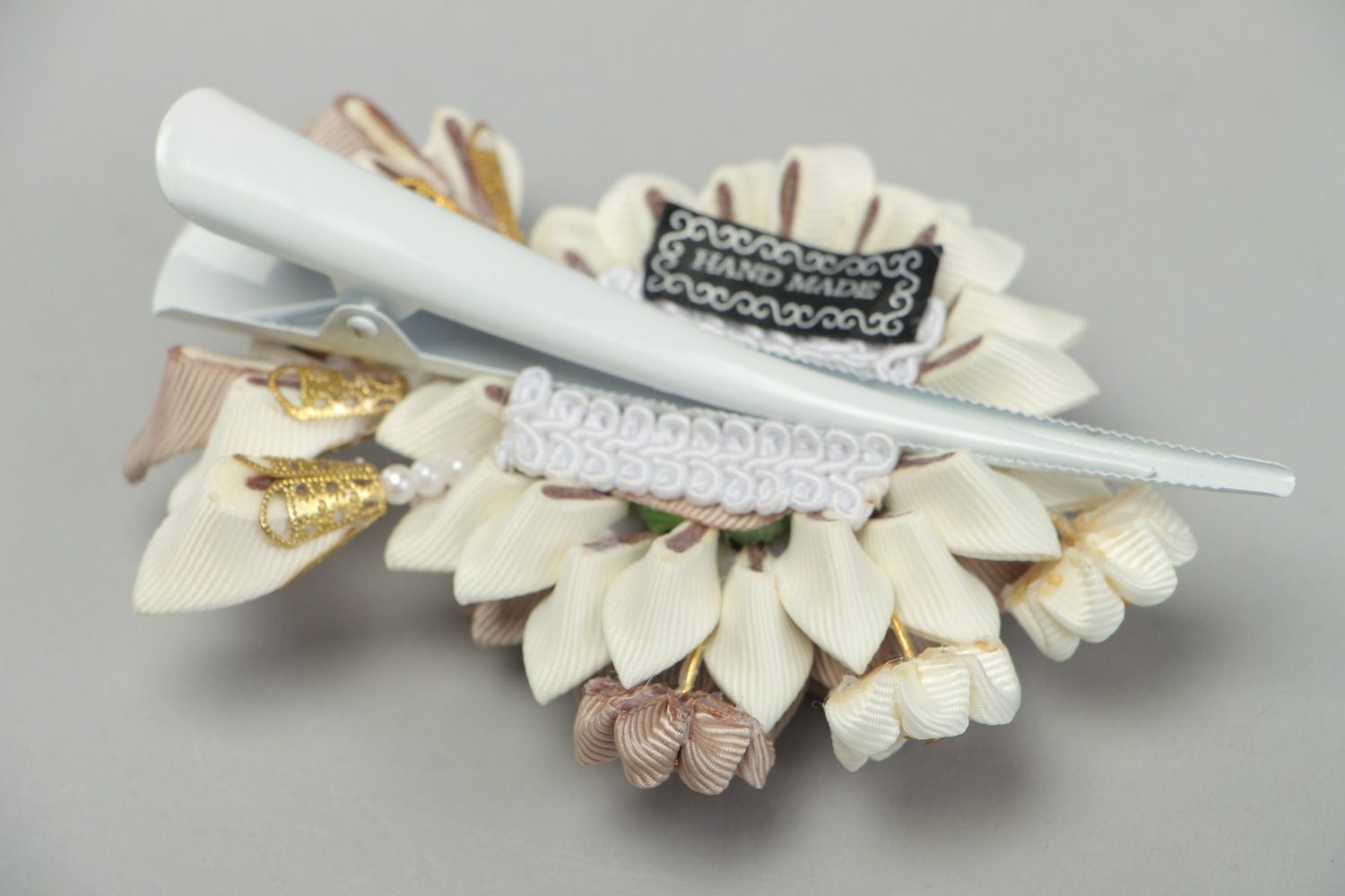 Beautiful handmade hair clip with kanzashi flower in white and cream color palette photo 3