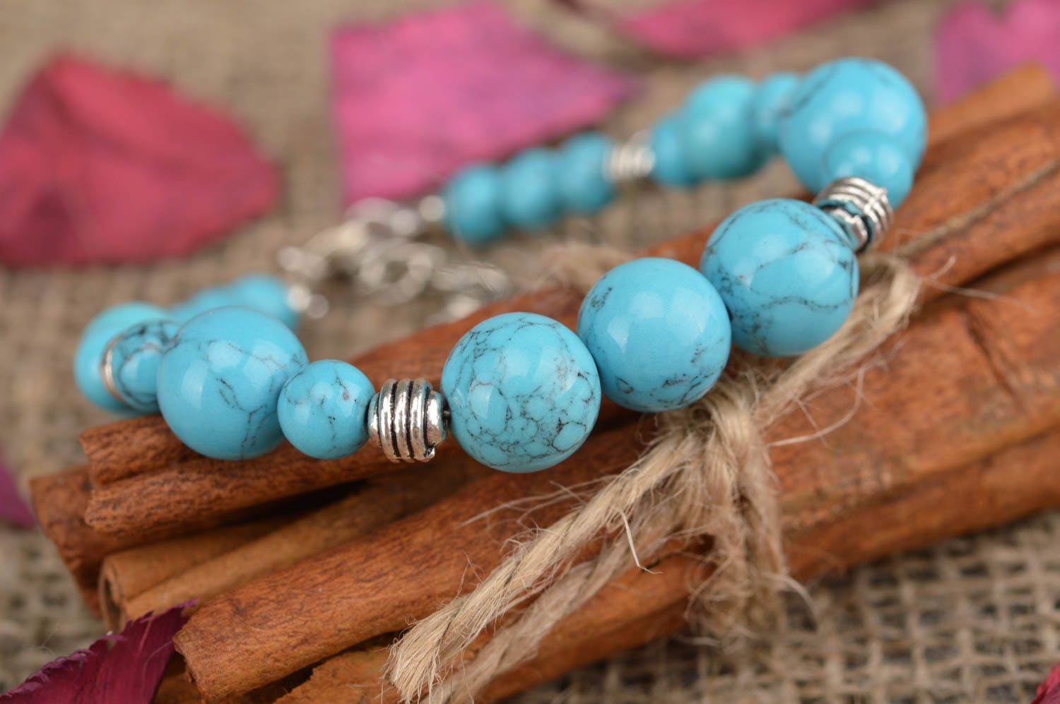 Blue handmade bracelet made of beads of turquoise color with separators photo 1