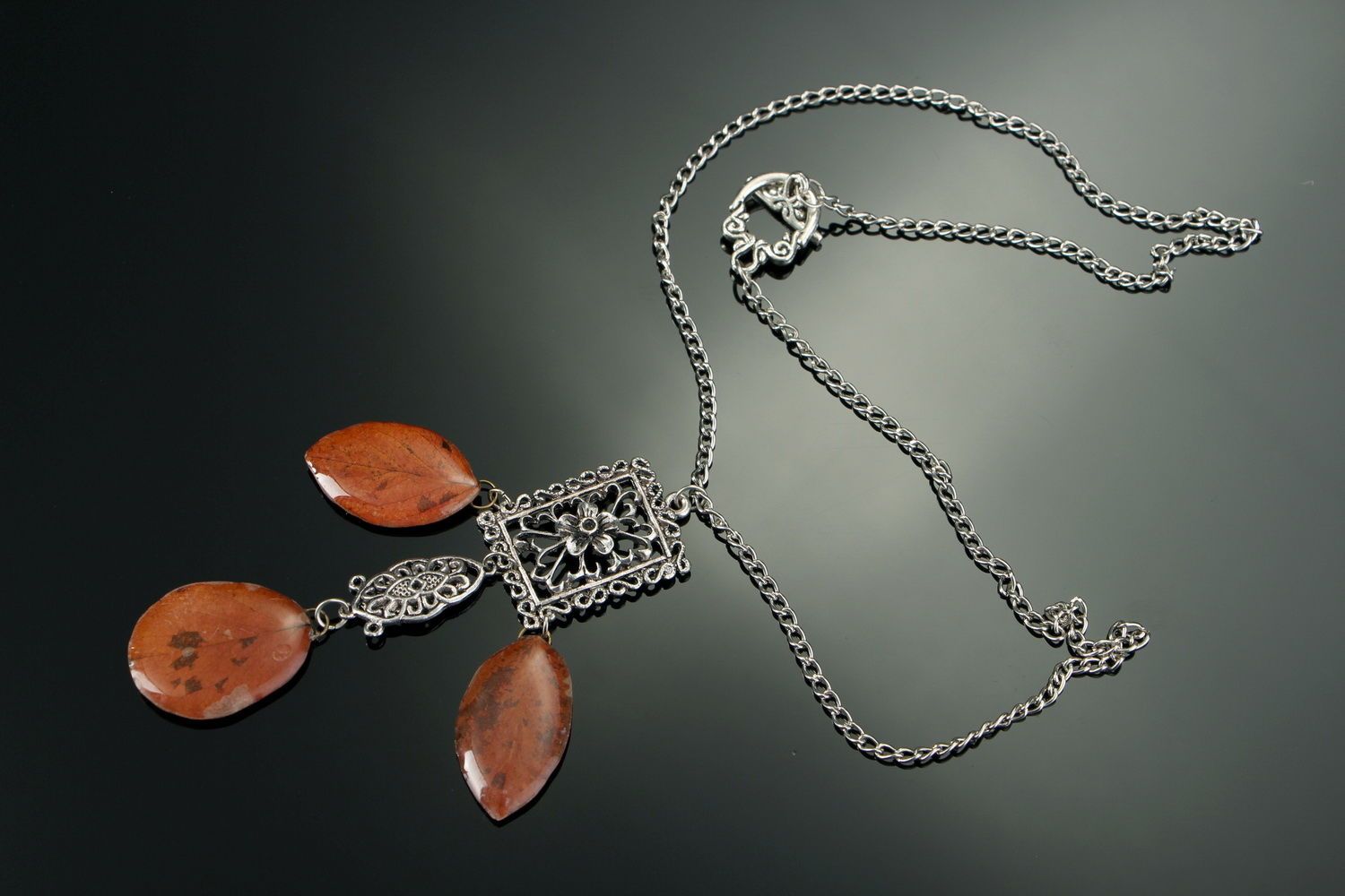 Necklace made of leaves of acacia, coated with epoxy resin photo 2