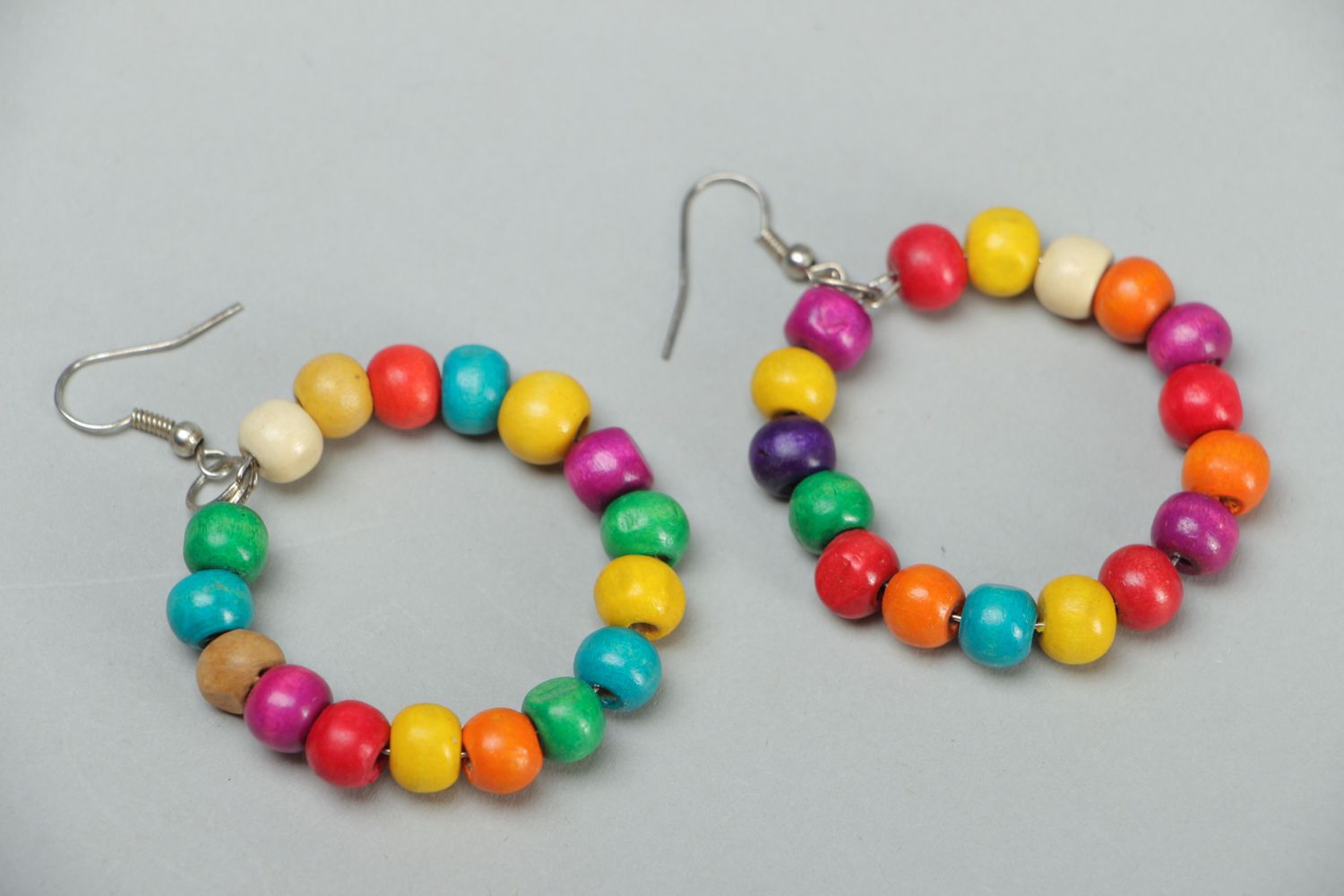 Large hoop earrings with colorful wooden beads photo 1