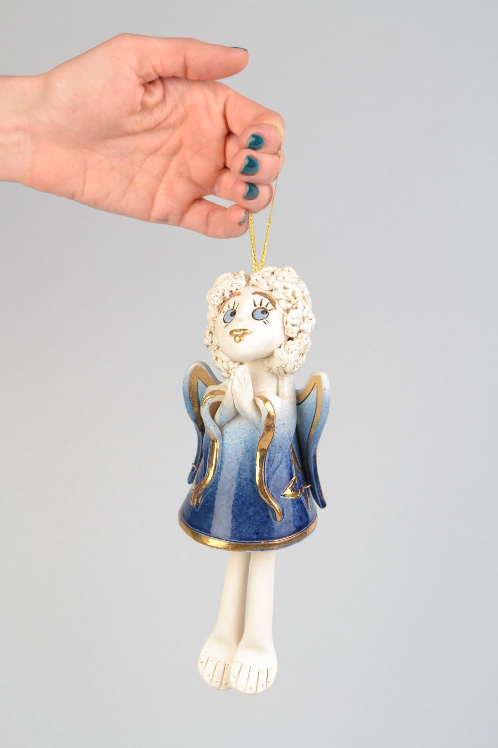 Handmade designer clay bell painted with glaze in the shape of angel photo 1