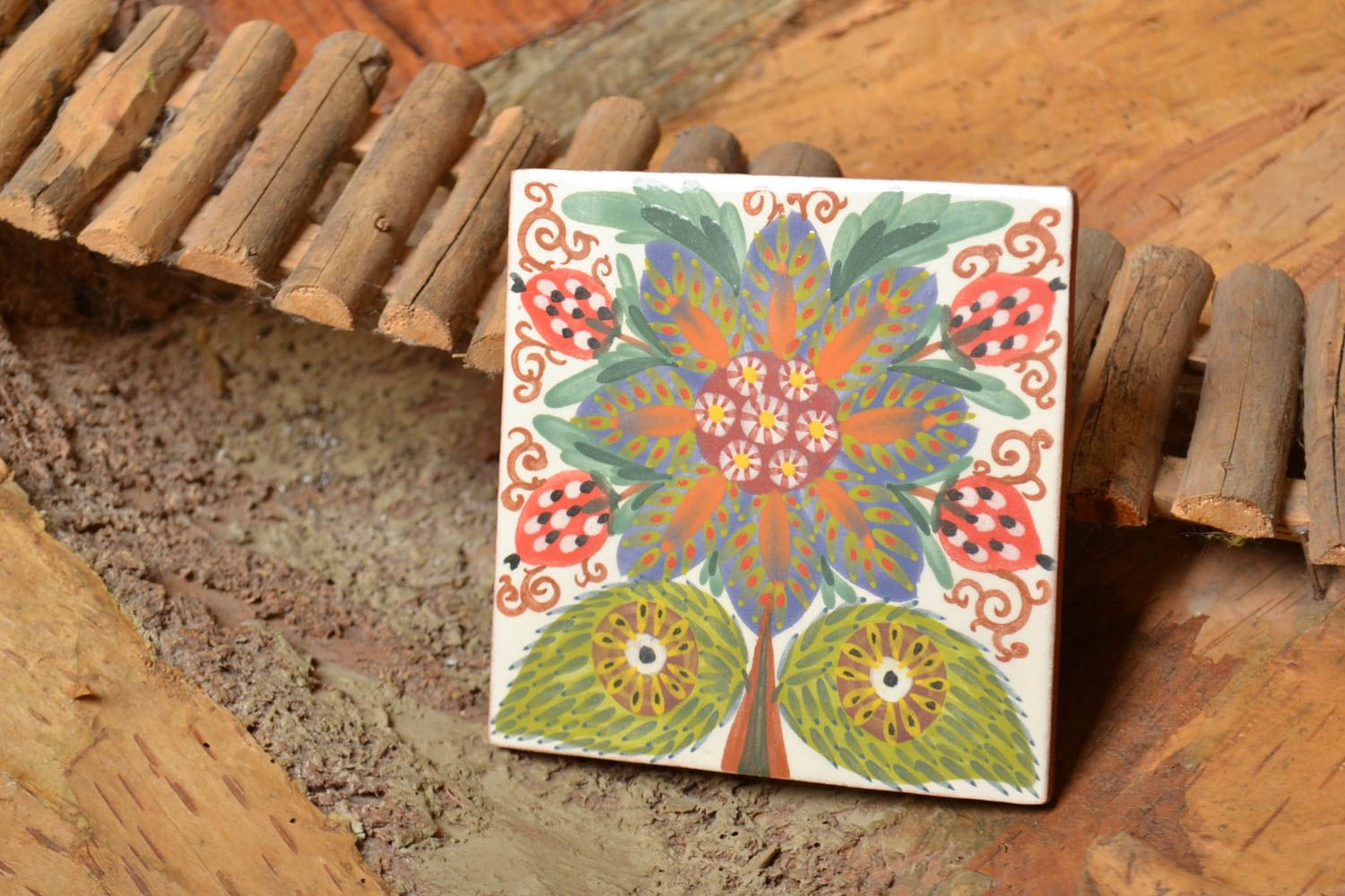 Handmade decorative ceramic tile painted with engobes with colorful flower image photo 1