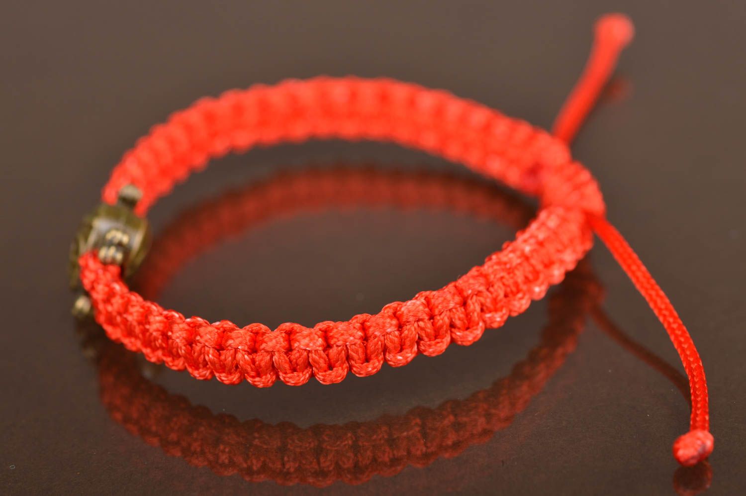 Unusual beautiful handmade designer friendship bracelet woven of red threads  photo 5