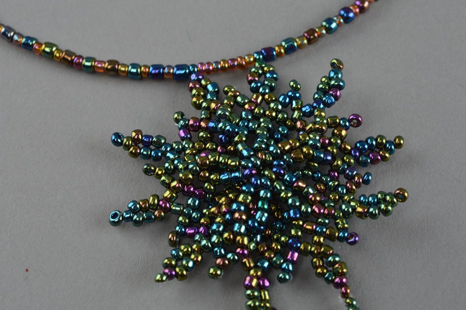 Handmade woven beaded thin necklace with stars on a fishing line photo 3