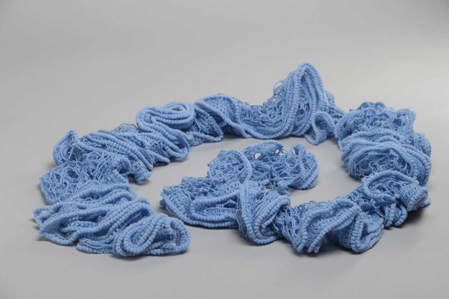 Beautiful stylish women's handmade narrow crochet scarf of blue color photo 3