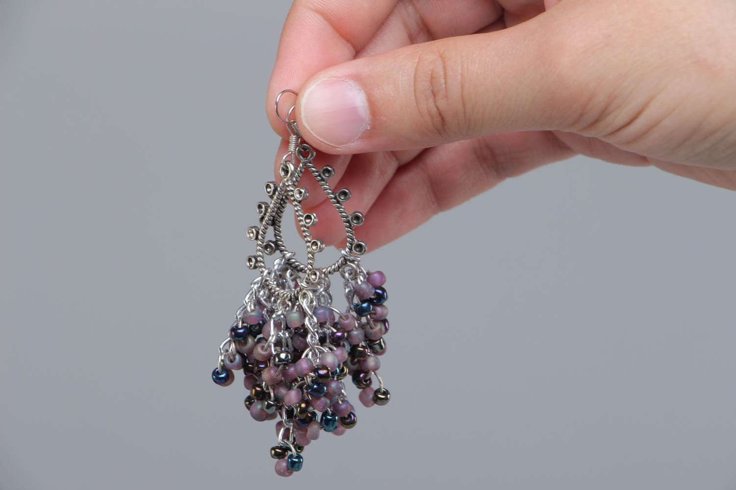 Long metal handmade earrings decorated with small beads photo 5