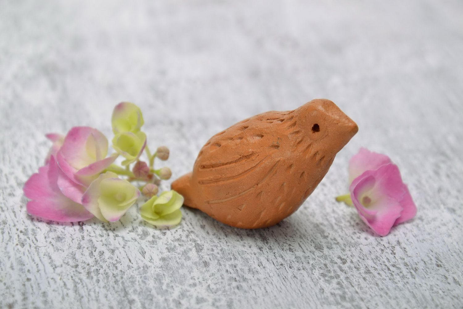 Clay penny whistle Nestling photo 5
