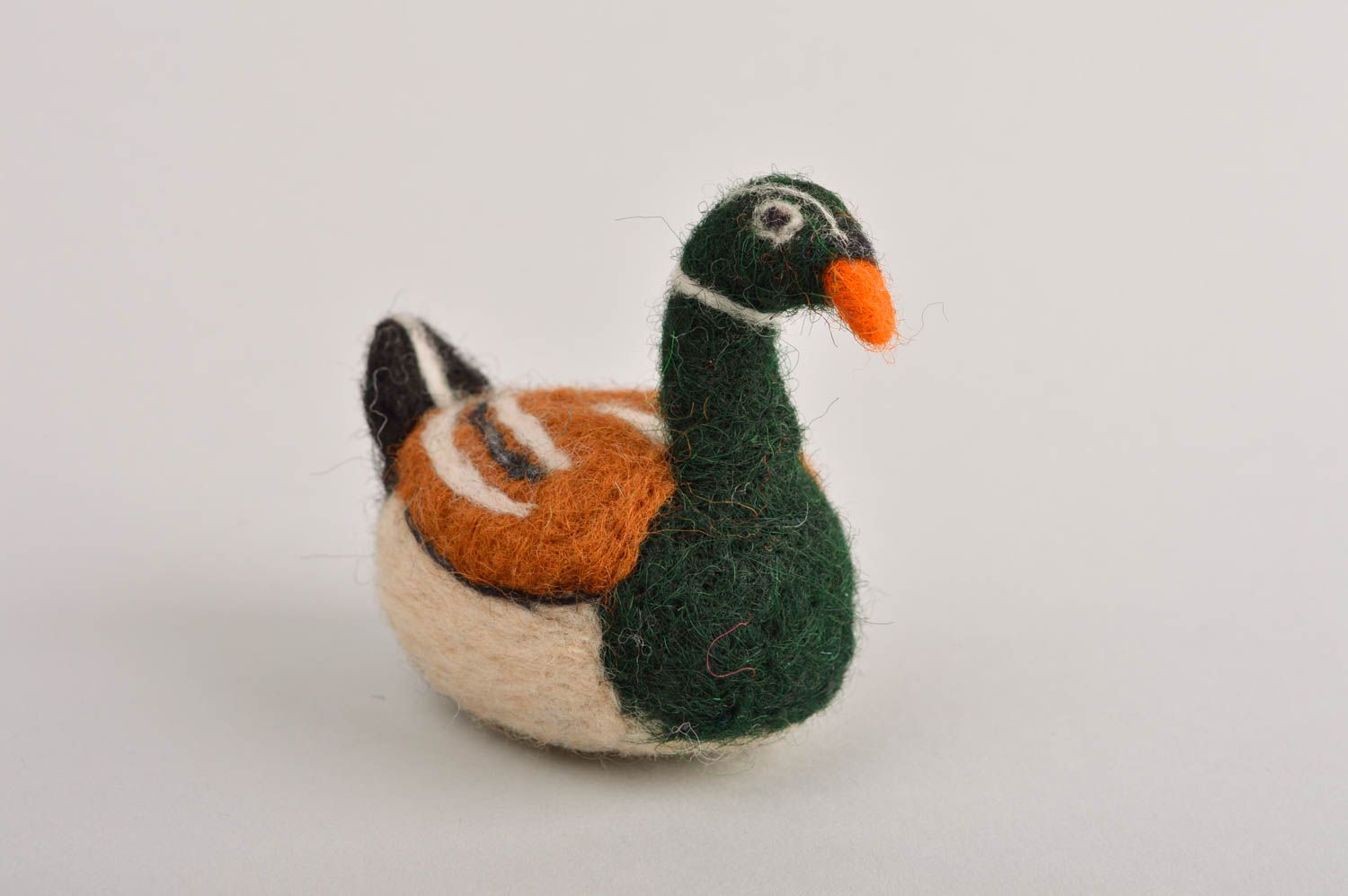 Kleines Kuscheltier Ente handmade Spielzeug aus Wolle Geschenk für Kinder foto 2