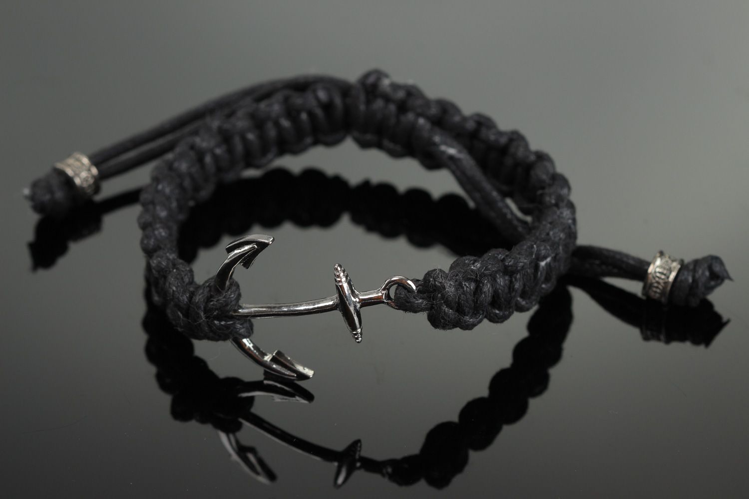 Handmade designer friendship bracelet woven of waxed cord with anchor charm unisex photo 1