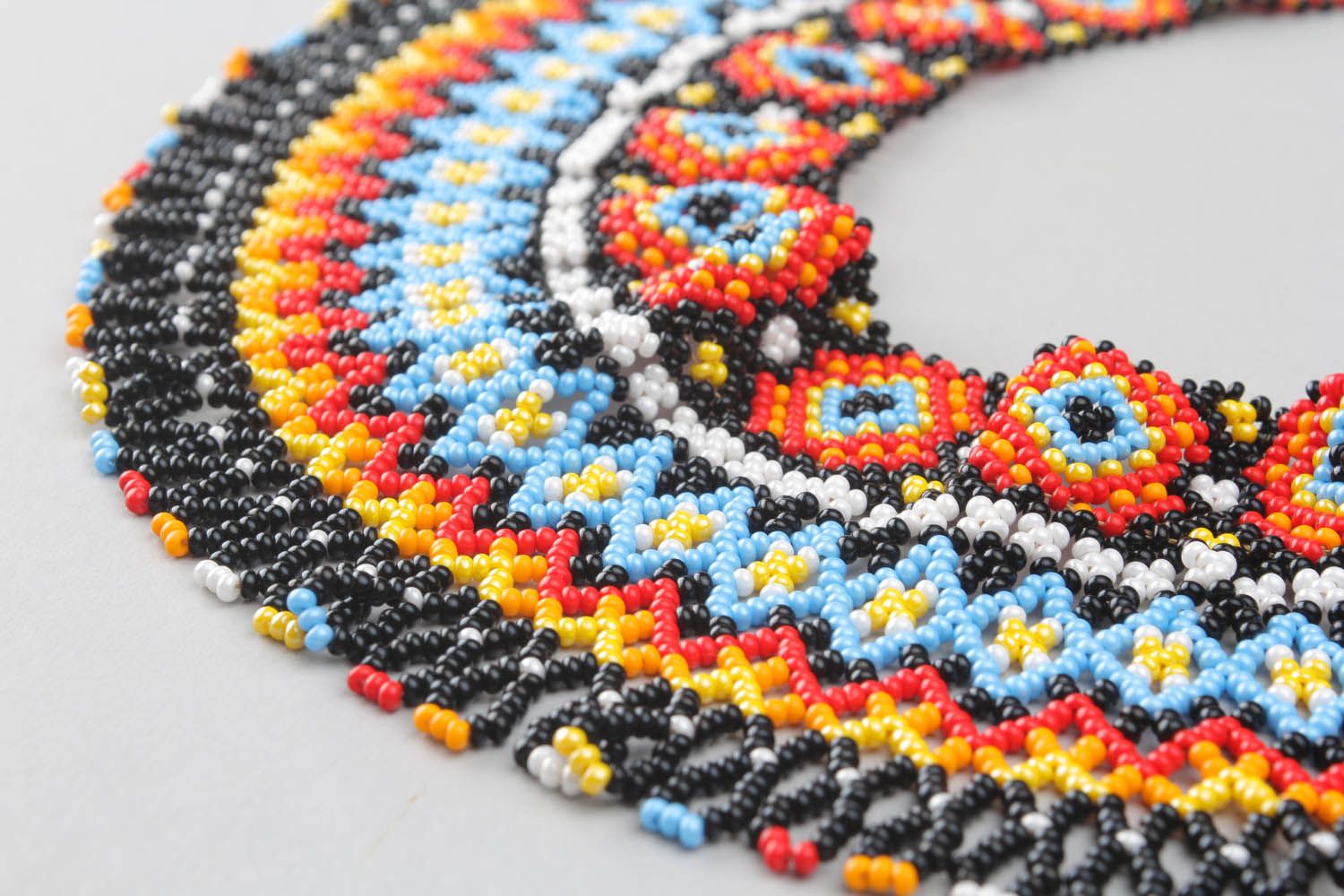 Broad beaded necklace with ornament photo 5