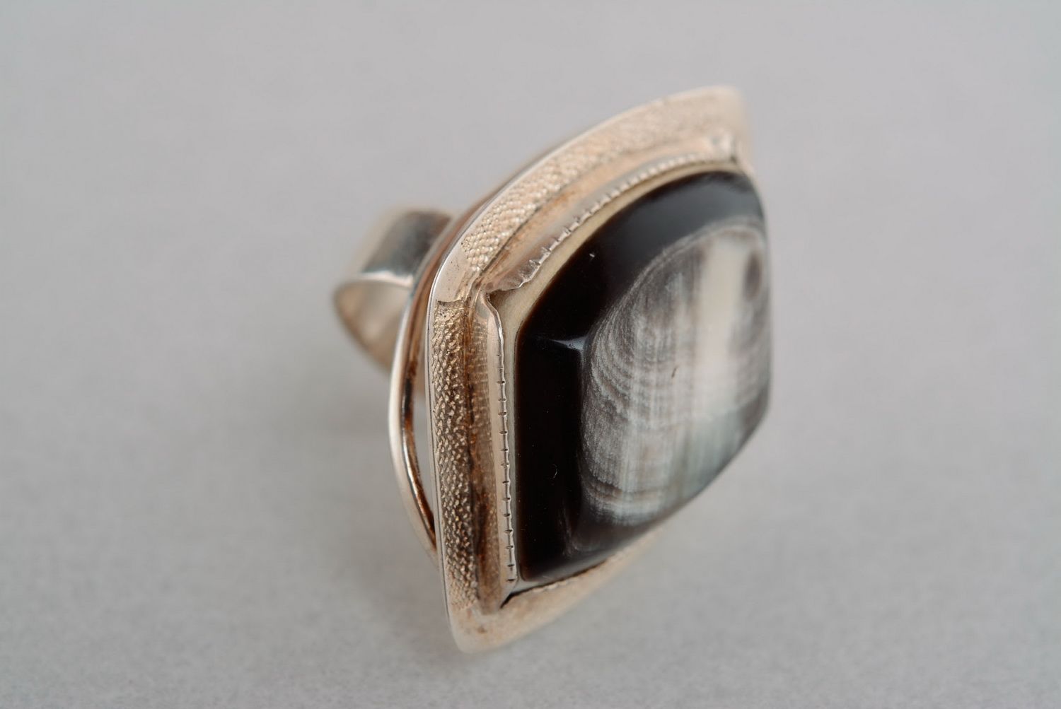 Ring with a cow horn photo 4