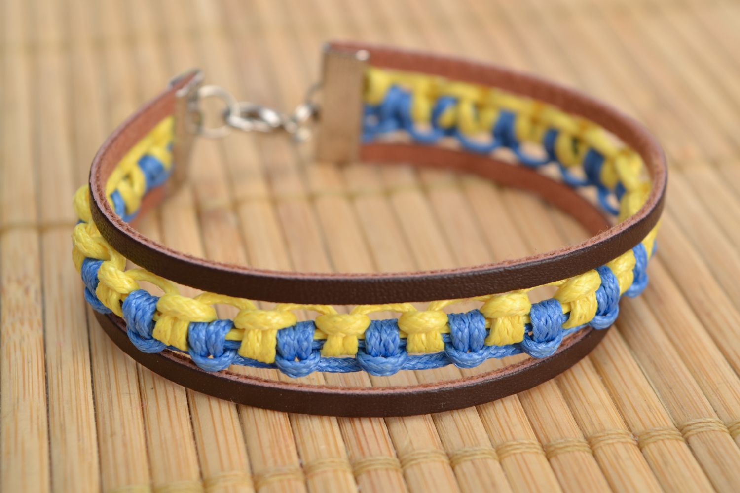 Yellow and blue bracelet with leather and waxed cord photo 1