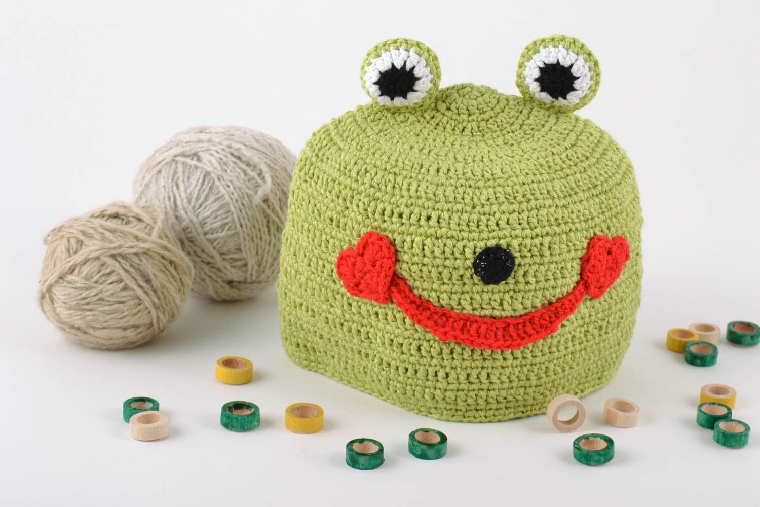 Handmade crocheted hat made of cotton threads in the form of green frog for boys photo 1