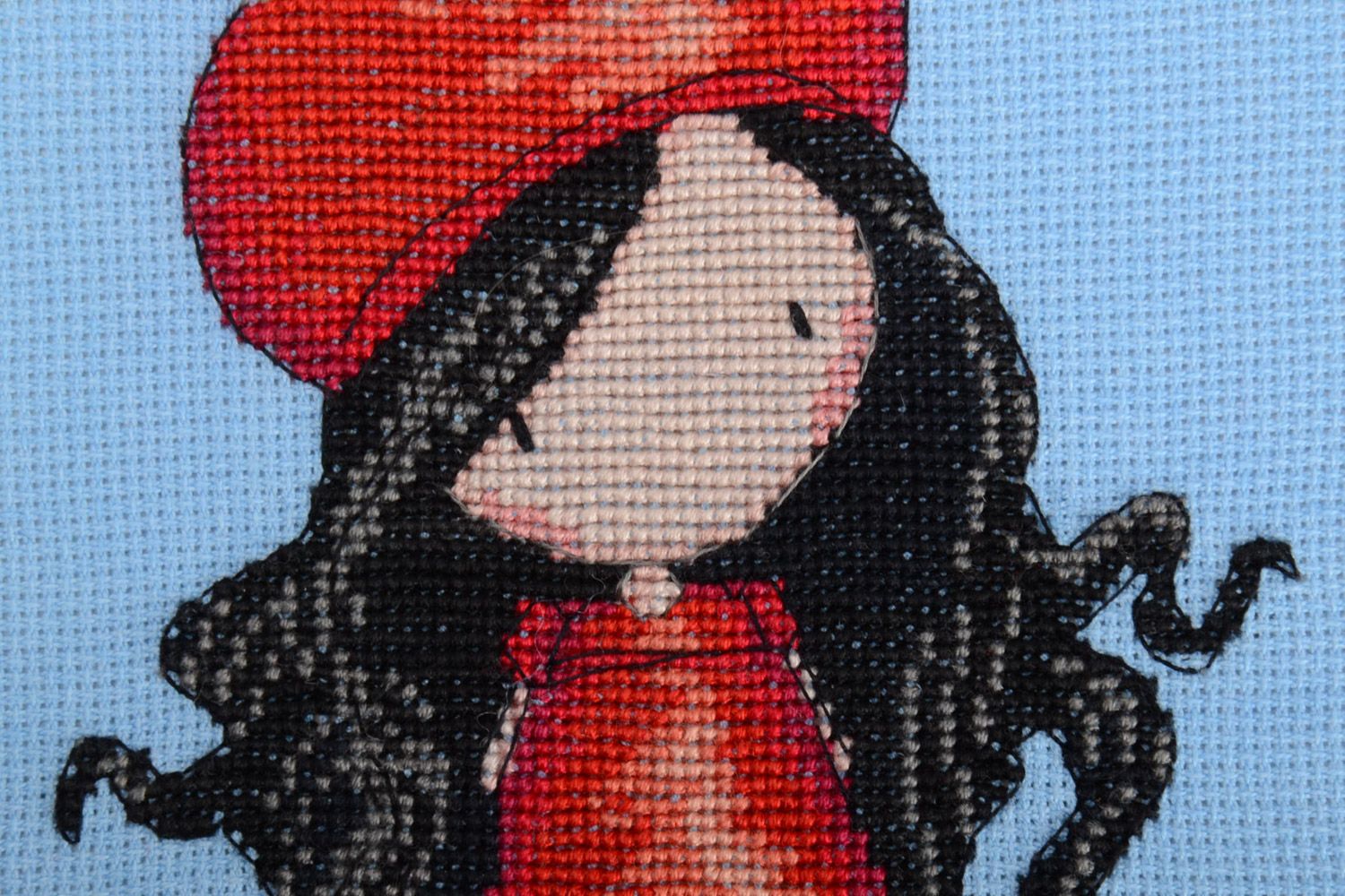 Handmade small embroidered picture with girl in red dress on blue background photo 3