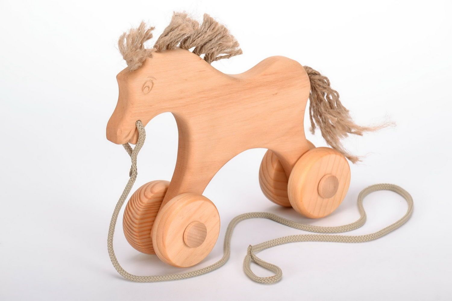Cavalo-cadeira de rodas de madeira foto 1
