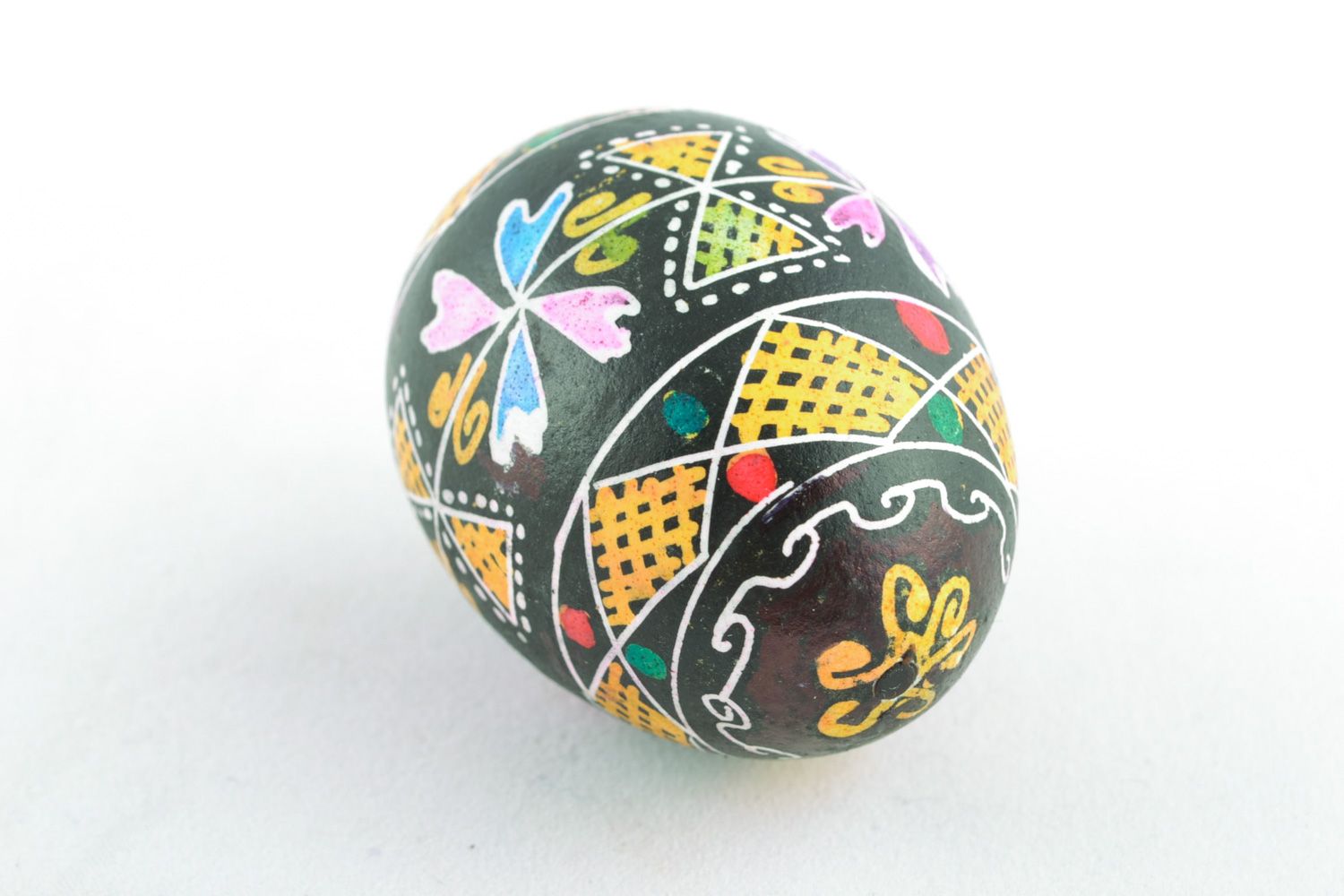Beautiful colorful Easter egg with traditional painting made using wax technique photo 3