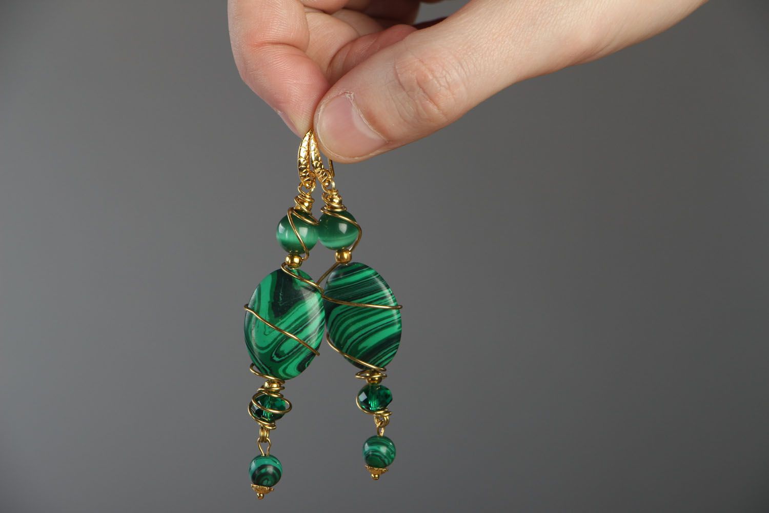 Long natural stone earrings of green color photo 4