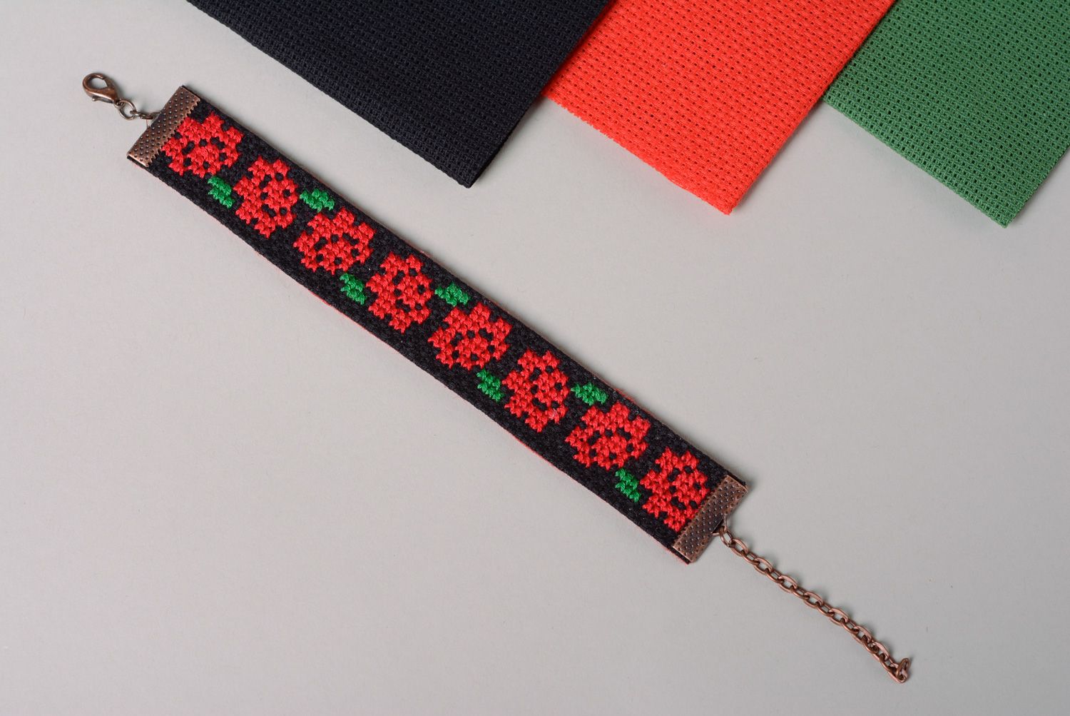 Black wrist bracelet with handmade contrast ethnic cross stitch embroidery for women photo 1
