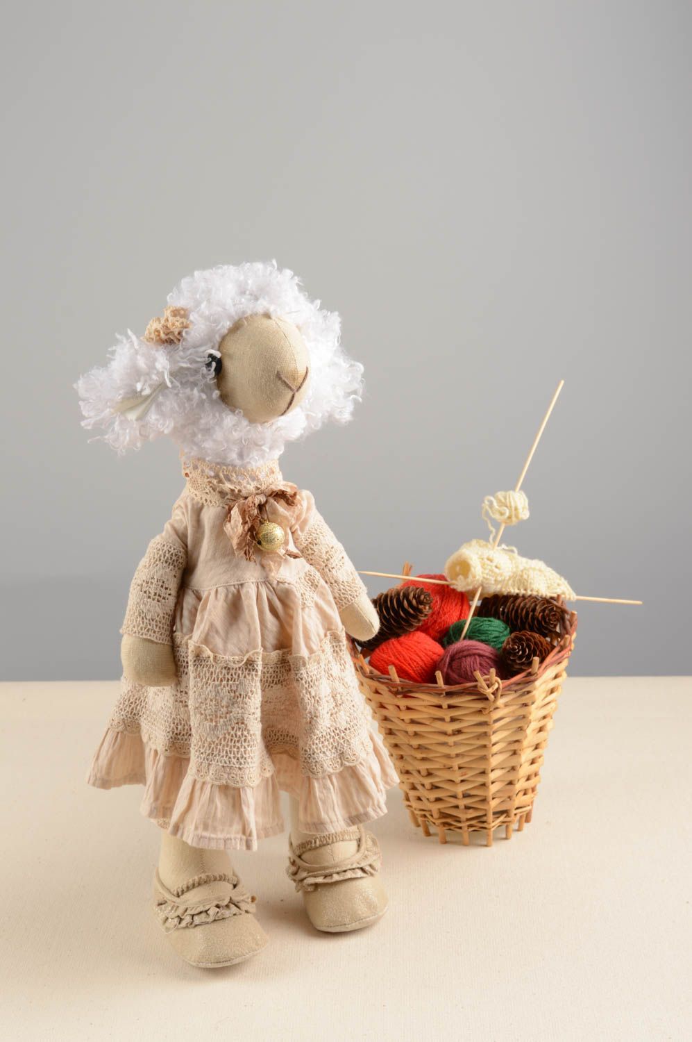 Handmade designer soft toy sewn of natural fabrics lamb in beige dress photo 1