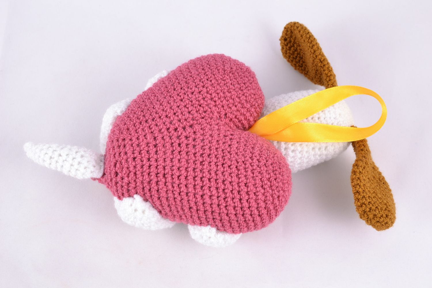 Giocattolo a maglia fatto a mano pupazzo a forma di cane con cuore a uncinetto foto 4