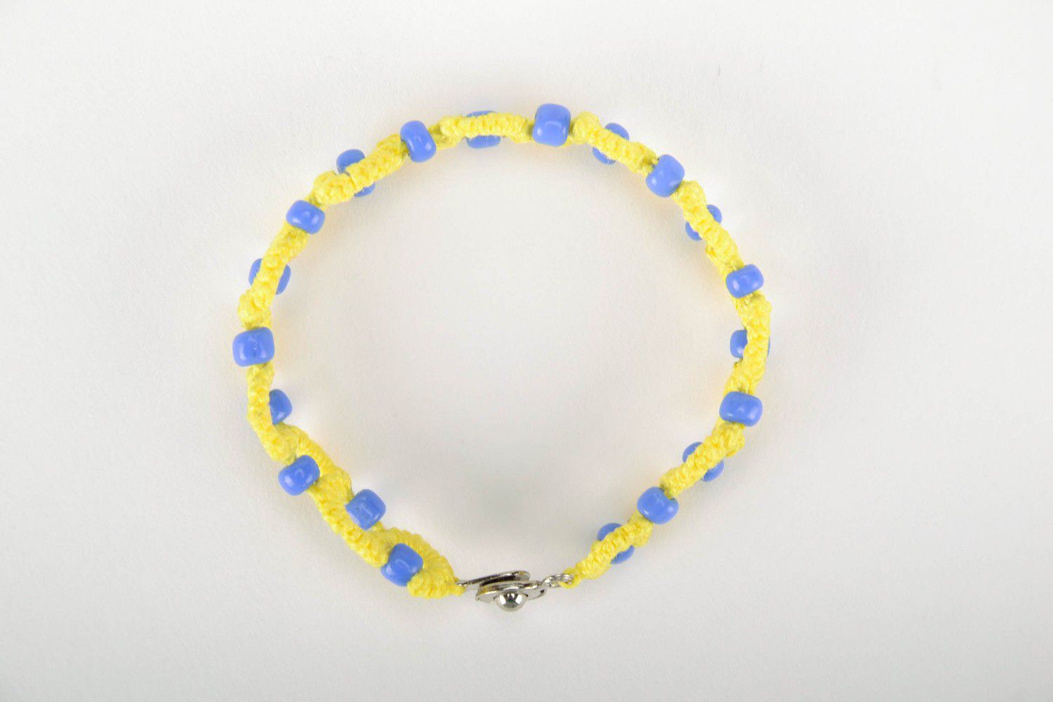 Yellow and blue bracelet made from cotton threads photo 4