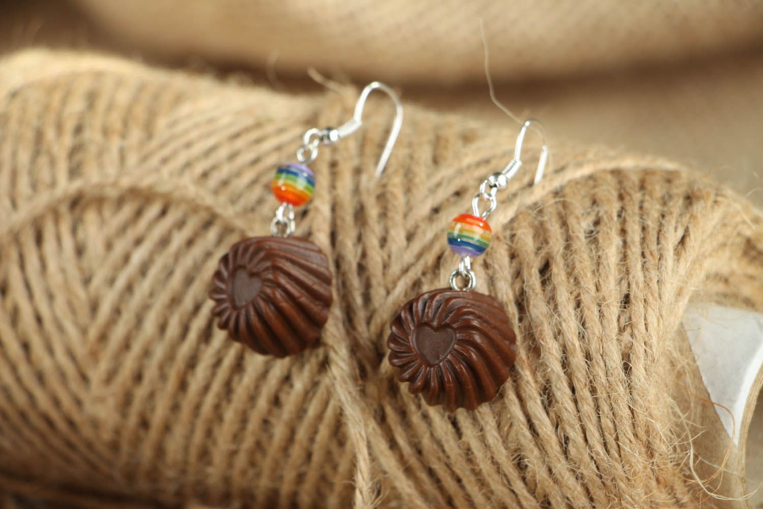 Earrings with charms in the shape of chocolates photo 3