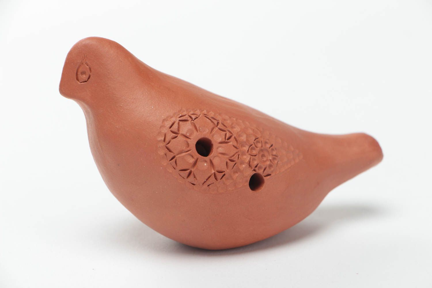 Small homemade brown clay penny whistle ocarina in the shape of bird photo 2