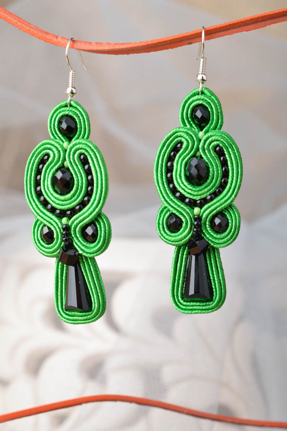 Handmade massive long soutache earrings in green color for an evening event photo 1